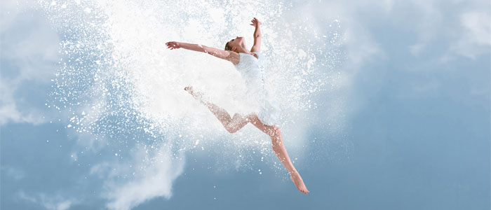 woman happily floating through air